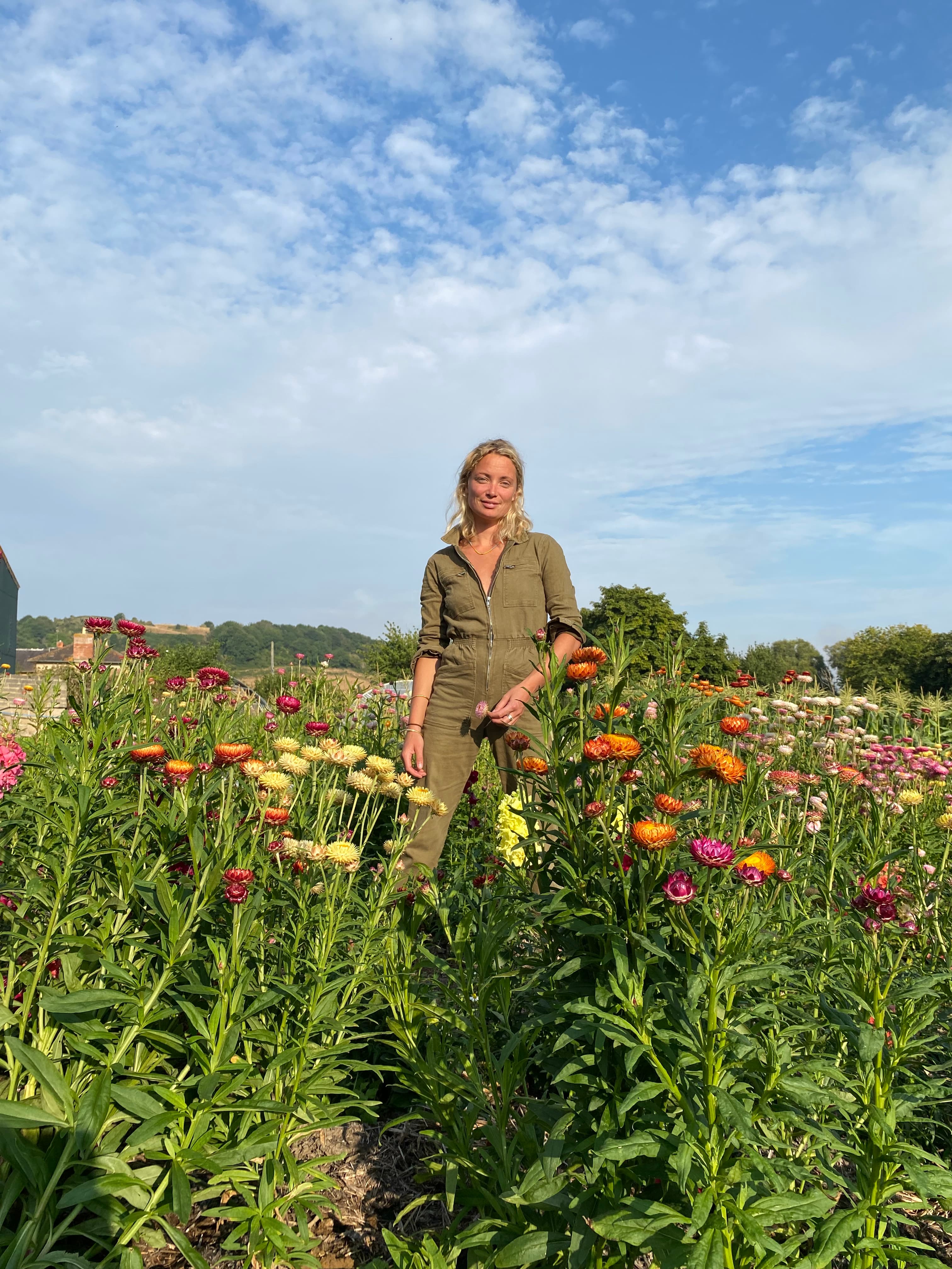 Photo of Alice Loveday Colfox in a field with flowers
